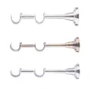 Classic curtain pole bracket shown in three finishes, featuring a double support design for 25mm curtain poles