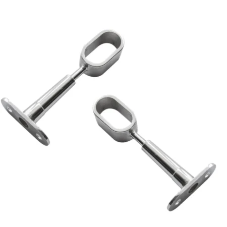 Wardrobe_Rail_Oval_RUN_brackets 30x15_pair Pair of chrome-plated oval wardrobe rail brackets with elongated oval openings and wall mounting plates.