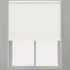 White roller blind installed on a window
