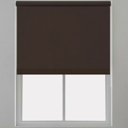 Brown roller blind installed on a window