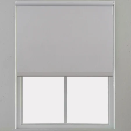 Light gray roller blind installed on a window