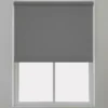 Grey roller blind installed on a window