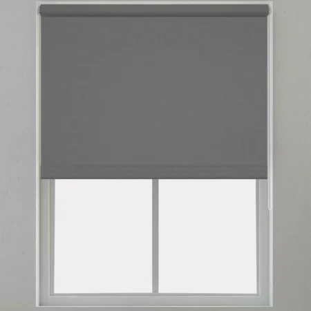 Grey roller blind installed on a window