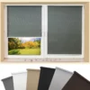 Blackout roller blinds in grey fitted to white window frames with multiple colour options