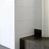 White PVC Corner Protector on a Tiled External Corner, 1m White PVC wall corner protector trim fitted to an external corner of white tiles