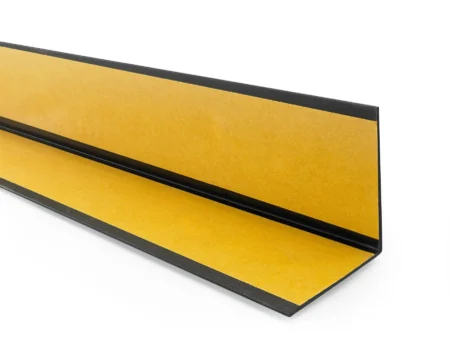 Black PVC angle trim, reverse side with the self-adhesive tape Reverse side of the Black PVC wall corner protector trim showing the adhesive tape
