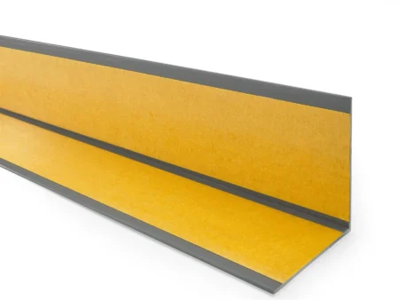 Dark Gray PVC angle trim, reverse side with the self-adhesive tape Reverse side of the Dark Gray PVC wall corner protector trim showing the adhesive tape