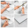 Fitting the self-adhesive PVC angle trim to a wall corner Fitting self-adhesive PVC wall corner protector angle trim onto a wall corner
