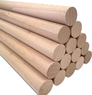Beech dowel rods stacked in a pyramid, all six diameters Wooden dowel rods stacked in a pyramid showing the 8 mm to 25 mm range